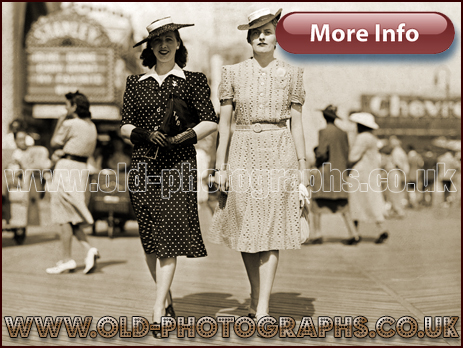 Fashion : Two women walking on a boardwalk [c.1935]